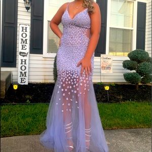 Gorgeous sheer beaded Jovani lavender prom gown.